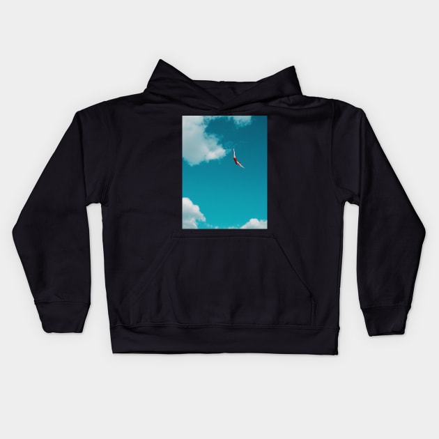 Sky Diver: Woman in Red Bathing Suit Dives Gracefully Through the Clouds Kids Hoodie by Ofeefee